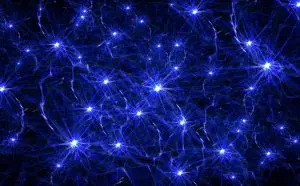 a black photo with neon blue neurons lighting up